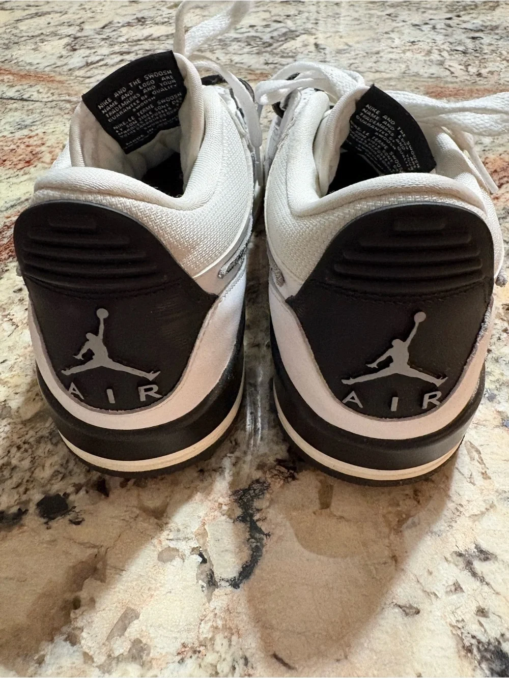 Jordan White and Black Athletic Shoes